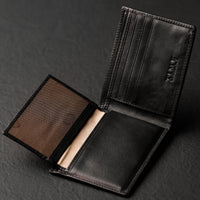 Leder-Bifold-Geldbörse - Poetic Justice