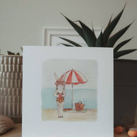 Hasenmädchen am Strand / Klappkarte - The Baltic Shop