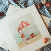 Hasenmädchen am Strand / Klappkarte - The Baltic Shop