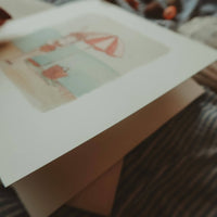 Hasenmädchen am Strand / Klappkarte - The Baltic Shop