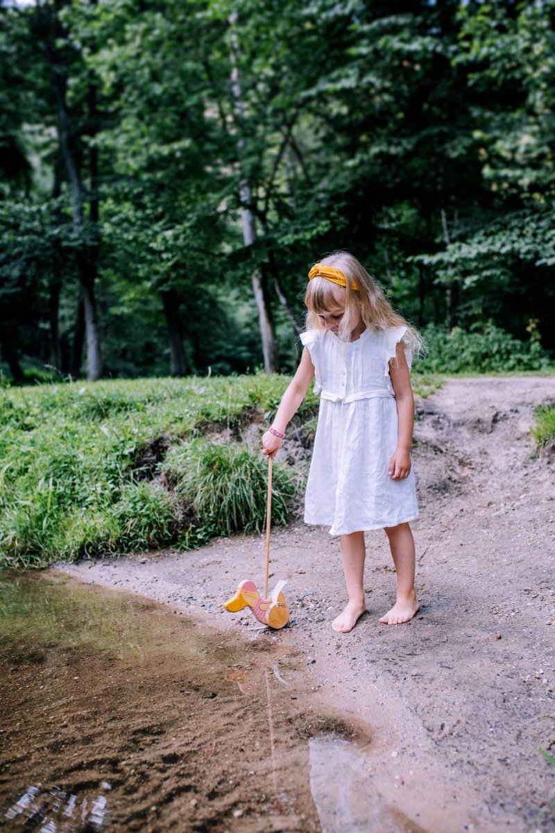 Schiebente aus Birkenholz in Rosa - The Baltic Shop